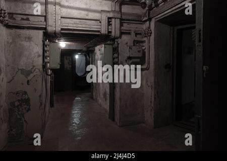 Abstract dark military bunker interior, grungy underground rooms Stock Photo
