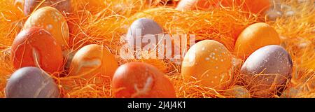Mulicoloured Painted Easter eggs in decorative mesh. Stock Photo
