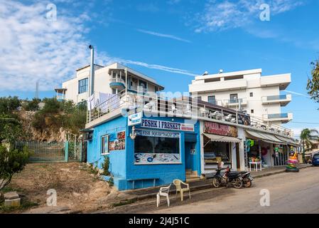 Ksamil, Albania - September 9, 2021: Fresh fish and Fish Grill trading point in Ksamil. They can immediately cook fresh fish bought from them. Stock Photo
