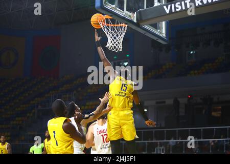 Cairo, Egypt. 15th Apr, 2022. Aboubacar Gakou (top) of Petro de Luanda goes for a lay-up during the match between Zamalek of Egypt and Petro de Luanda of Angola at the 2022 Basketball Africa League (BAL) in Cairo, Egypt, April 15, 2022. Credit: Ahmed Gomaa/Xinhua/Alamy Live News Stock Photo