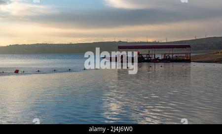 Tbilisi sea and boat with deflated sails. Landscape. Sunrise Stock Photo