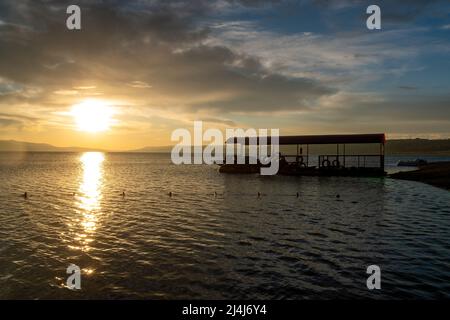 Tbilisi sea and boat with deflated sails. Landscape. Sunrise Stock Photo