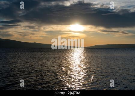 Tbilisi sea and boat with deflated sails. Landscape. Sunrise Stock Photo