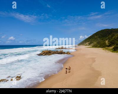 St Lucia South Africa, Rocks sand ocean, and blue coastal skyline at Mission Rocks beach near Cape Vidal in Isimangaliso Wetland Park in Zululand. South Africa St Lucia Stock Photo