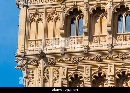 Upper detail of recently uncovered restored Elizabeth Tower, Big Ben, of the Palace of Westminster, London. Bright colours. Detailed carvings Stock Photo