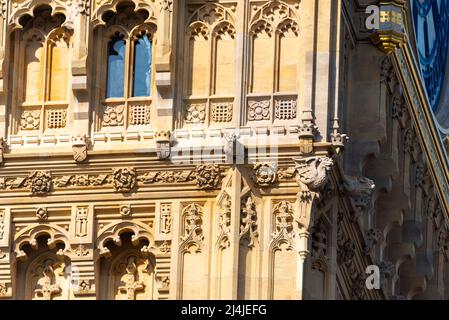 Upper detail of recently uncovered restored Elizabeth Tower, Big Ben, of the Palace of Westminster, London. Bright colours. Detailed carvings Stock Photo