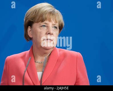Berlin, Germany. 24th Aug, 2015. Chancellor of the Federal Republic of Germany Angela Merkel during a joint briefing with President of Ukraine Petro Poroshenko and French President Francois Hollande. (Photo by Mikhail Palinchak/SOPA Images/Sipa USA) Credit: Sipa USA/Alamy Live News Stock Photo