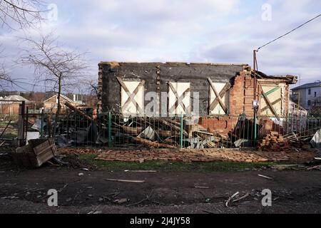 SUMY, UKRAINE - APRIL 14, 2022 - A house destroyed by Russian shelling is pictured in Sumy, northeastern Ukraine. Stock Photo