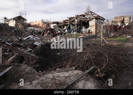 SUMY, UKRAINE - APRIL 14, 2022 - Buildings destroyed as a result of Russian shelling lie in ruins in Sumy, northeastern Ukraine. Stock Photo