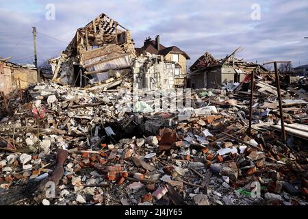 SUMY, UKRAINE - APRIL 14, 2022 - The houses destroyed by Russian shelling lie in ruins, Sumy, northeastern Ukraine. Stock Photo
