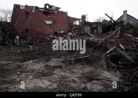 SUMY, UKRAINE - APRIL 14, 2022 - A building destroyed as a result of Russian shelling is pictured in Sumy, northeastern Ukraine. Stock Photo