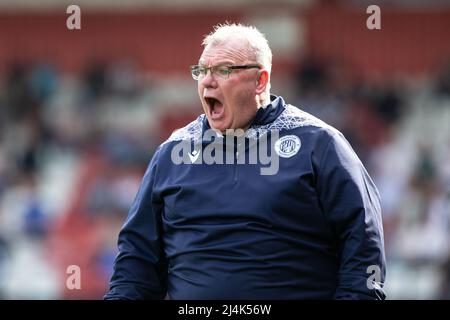 Scottish football manager Steve Evans shouting instructions from the touchline during game whilst head coach at Stevenage Football Club Stock Photo