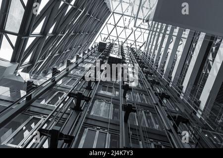 Modern steel background and abstract metal structure, black and white low angle high contrast picture Stock Photo