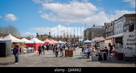 Crowds shopping at Salisbury Saturday market in Salisbury, Wiltshire, UK on 16 April 2022 Stock Photo