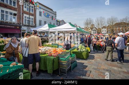 Crowds shopping at Salisbury Saturday market in Salisbury, Wiltshire, UK on 16 April 2022 Stock Photo