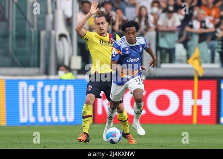 Turin, Italy, 16th April 2022. Juan Cuadrado of Juventus takes on Arthur Theate of Bologna FC during the Serie A match at Allianz Stadium, Turin. Picture credit should read: Jonathan Moscrop / Sportimage Credit: Sportimage/Alamy Live News Stock Photo