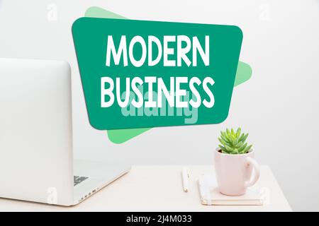 Sign displaying Modern Business. Conceptual photo Introduction to the philosophy of large corporate enterprise Tidy Workspace Setup, Writing Desk Stock Photo