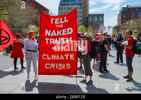 Climate activists are seen holding pro Climate Justice banner at Washington Square Park, New York City on April 16, 2022.