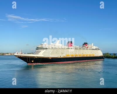 Nassau, Bahamas - October 13, 2021:  The Disney cruise ship sailing into Nassau, Bahamas port for the day. Stock Photo