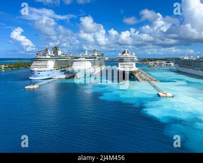 Nassau, Bahamas - October 13, 2021: An aerial view of the cruise ship harbor in Nassau, Bahamas from a cruise ship that is sailing away. Stock Photo