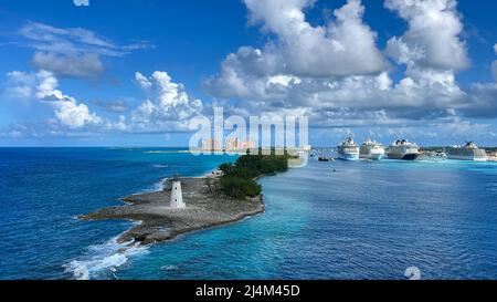 Nassau, Bahamas - October 13, 2021: An aerial view of the cruise ship harbor in Nassau, Bahamas from a cruise ship that is sailing away. Stock Photo