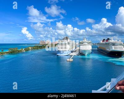 Nassau, Bahamas - October 13, 2021: An aerial view of the cruise ship harbor in Nassau, Bahamas from a cruise ship that is sailing away. Stock Photo