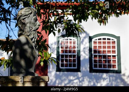 Tiradentes, Minas Gerais, Brazil - July 14, 2021: Tiradentes metal statue representing the ensign on a public road - side view Stock Photo