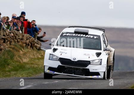 16th April 2022, Ballymena, County Antrim, Northern Ireland, United Kingdom; Circuit of Ireland International Rally, Round 3 of the Irish Tarmac Rally Championship: Cathan McCourt and Liam Moynihan (Fabia R5) are spectacular over the jumps Stock Photo