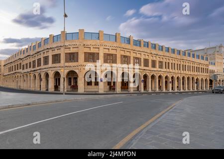 facade of historic Falcon Souq building near Souq Waqif, a market selling live falcon birds and falconry equipment. Stock Photo