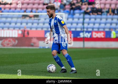 WIGAN, UK. APR 15TH midfielder Graeme Shinnie (18)of Wigan Athletic during the Sky Bet League 1 match between Wigan Athletic and Cambridge United at the DW Stadium, Wigan on Saturday 16th April 2022. (Credit: Mike Morese | MI News) Credit: MI News & Sport /Alamy Live News Stock Photo
