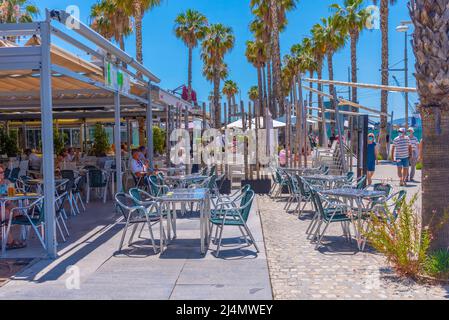 Malaga, Spain, May 24, 2021: Seaside restaurants at port of Malaga, Spain Stock Photo