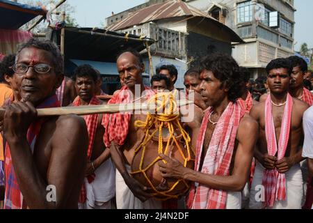 Dharma Thakur is a Hindu deity, symbolising the sun, some say it is a Hindu deity of death and justice, worshipped by villagers in the traditional Rarh region in the present-day Indian state of West Bengal as one of their special village gods (gram devata). Dharmaraja or Dharma Thakur was originally a non-Aryan god and a deity of the Kom tribe but was later elevated to the Vedic pantheon. Dharma Thakur is associated with agricultural and human fertility. Magical beliefs and rituals merge with Vedic rites in his worship. He is worshipped mainly by low-caste Hindus such as doms, bagdis and Hadis Stock Photo