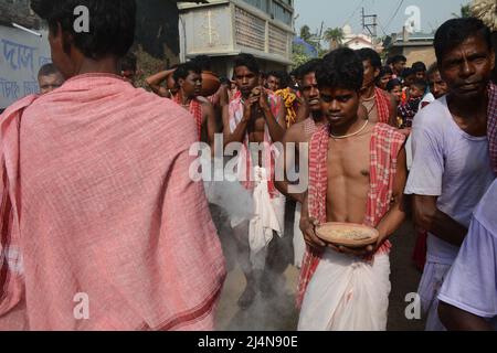 Santiniketan, West Bengal, India. 16th Apr, 2022. Dharma Thakur is a Hindu deity, symbolising the sun, some say it is a Hindu deity of death and justice, worshipped by villagers in the traditional Rarh region in the present-day Indian state of West Bengal as one of their special village gods (gram devata). Dharmaraja or Dharma Thakur was originally a non-Aryan god and a deity of the Kom tribe but was later elevated to the Vedic pantheon. Dharma Thakur is associated with agricultural and human fertility. Magical beliefs and rituals merge with Vedic rites in his worship. He is worshipped mainly Stock Photo