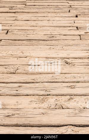 Textured background of uneven brown wooden boards Stock Photo