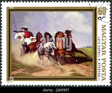 HUNGARY - CIRCA 1979: Postage stamp printed in Hungary, showing the painting 'Coach and Five' by a German-Hungarian painter Karoly Lotz, circa 1979 Stock Photo