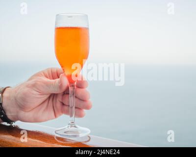 Beautiful glass with a drink. Side view, close-up. Vacation and travel concept. Moments of celebration Stock Photo