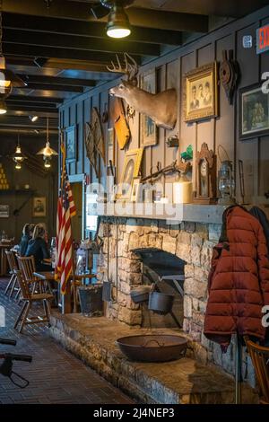 Fireplace hearth and wall decoration at Cracker Barrel Old Country Store restaurant in Winchester, Virginia. (USA) Stock Photo