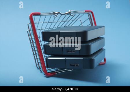 A stack of hard drives in a basket. Stock Photo