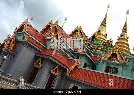 Phra Mahathat Chedi Phakdee Prakat Buddhist temple on top of hill for thai people and foreign travelers travel visit and respect praying buddha at Ban Stock Photo