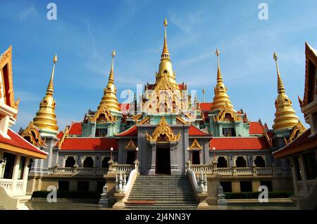 Phra Mahathat Chedi Phakdee Prakat Buddhist temple on top of hill for thai people and foreign travelers travel visit and respect praying buddha at Ban Stock Photo
