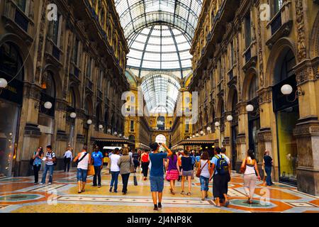 People walking through Galleria Vittorio Emanuele in Milan Italy Stock Photo