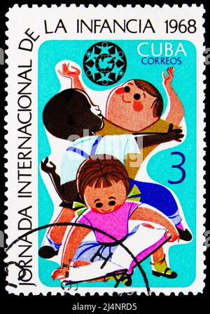 MOSCOW, RUSSIA - MARCH 27, 2022: Postage stamp printed in Cuba shows Children at Play, International Children Day serie, circa 1968 Stock Photo