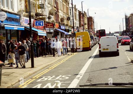 Queueing for Friday Jummah prayers at the Mosque in Hendon, London during Ramadan Stock Photo