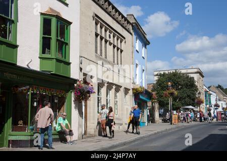 Views of people on the High Street in Glastonbury, Somerset in the UK Stock Photo