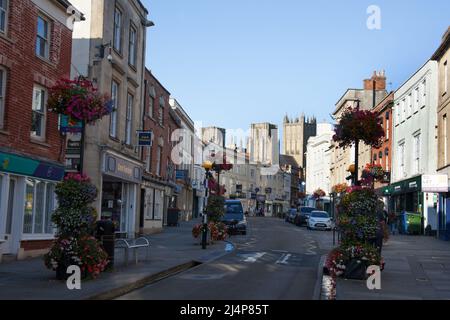 Shops on the High Street in Wells, Somerset in the UK Stock Photo