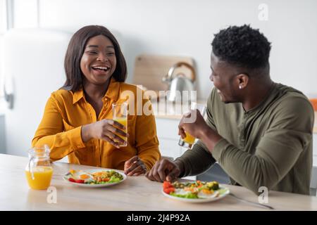 Portrait Of Young Black Couple Having Brekafast Together At Home Stock Photo