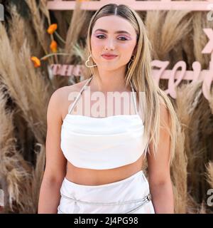 La Quinta, United States. 16th Apr, 2022. LA QUINTA, RIVERSIDE, CALIFORNIA, USA - APRIL 16: Peyton List attends REVOLVE x The h.wood Group Present REVOLVE FESTIVAL 2022 held at the Merv Griffin Estate on April 16, 2022 in La Quinta, Riverside, California, United States. (Photo by Xavier Collin/Image Press Agency) Credit: Image Press Agency/Alamy Live News Stock Photo