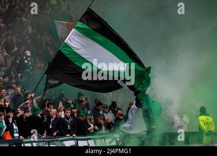 Glasgow, UK. 16th Apr, 2022. Scottish Cup semi final - Heart of Midlothian FC v Hibernian FC 16/04/2022 Pic shows: HibsÕ fans in full voice before the kick off as Hearts take on Hibs in the Scottish Cup semi final at Hampden Park, Glasgow Credit: Ian Jacobs/Alamy Live News Stock Photo