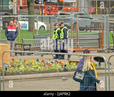 Glasgow, Scotland, UK 17th April, 2022, Heavy police presence in george square ahead of the celtic rangers clash in case of disorder and with the memory of last years trashing of the square by rangers fans, it has newly been relaid in the turf areas of the square as per my previous pictures.. Credit Gerard Ferry/Alamy Live News Stock Photo