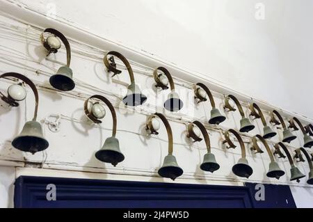 Series of call bells in the kitchen of a stately home. Stock Photo